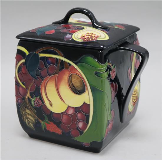 A Moorcroft two handled cube pot and cover